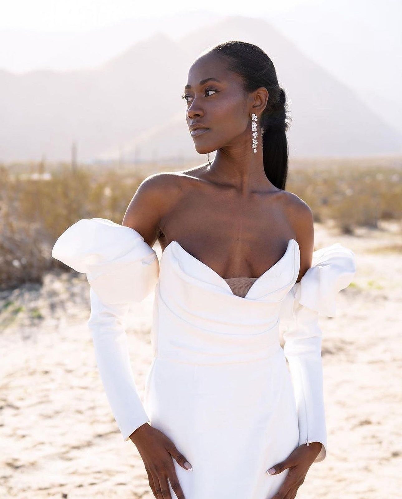 Bride wearing long statement earrings | EDEN LUXE Bridal