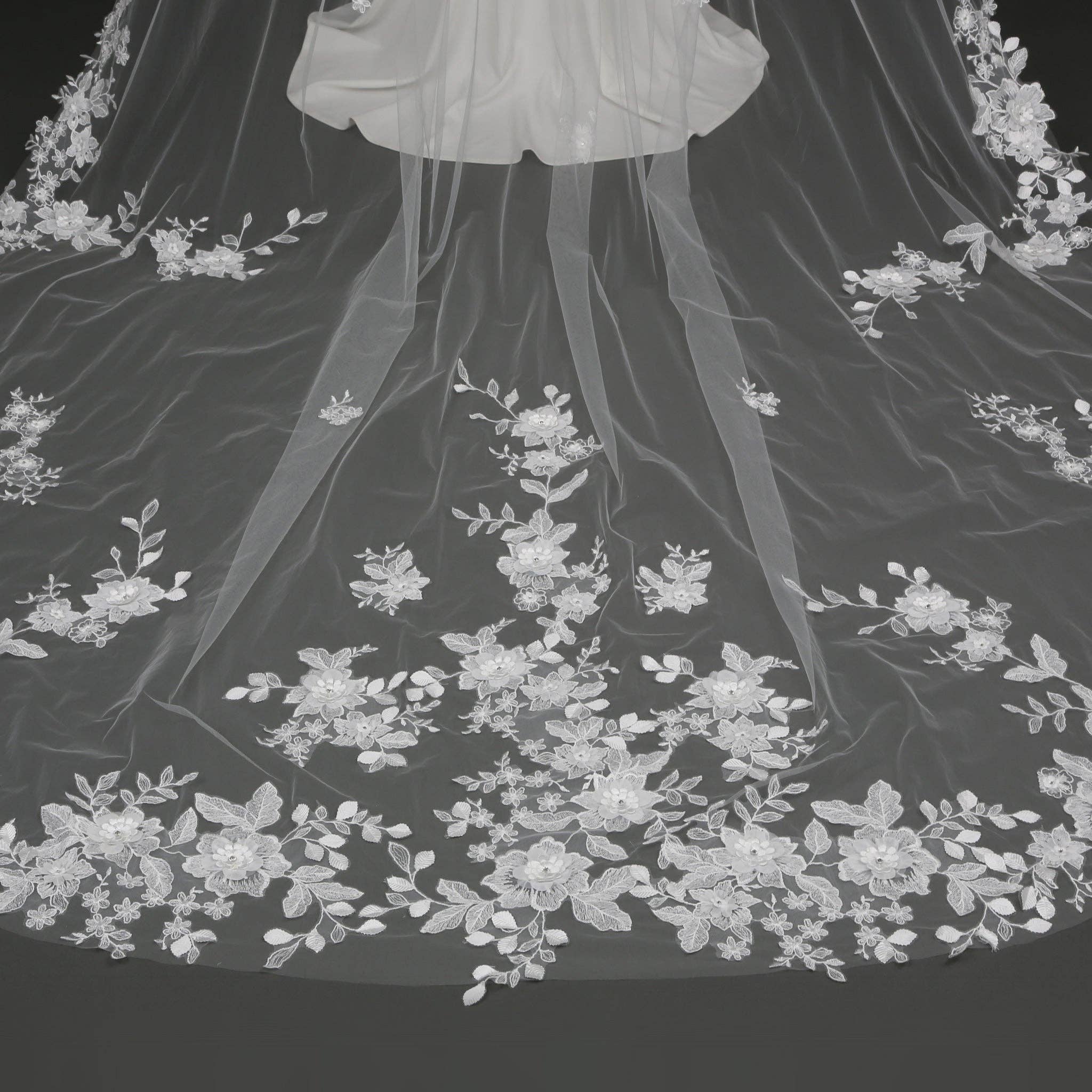 ELLINA veil’s hand-sewn floral details on sheer bridal illusion tulle. | EDEN LUXE Bridal