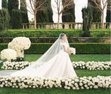 Bride wearing drop veil