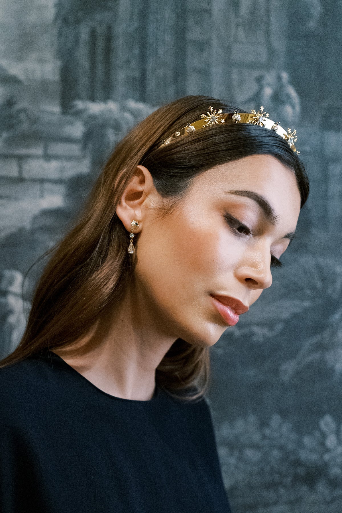 Madame Brillon fireworks headband and matching drop earrings worn with a navy dress in a period room at The Metropolitan Museum of Art, gold crystal headband for galas and weddings | EDEN LUXE Bridal