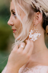 Bride wearing earrings | EDEN LUXE Bridal